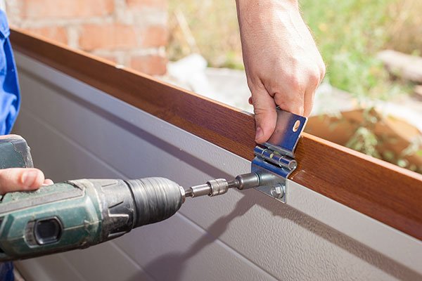 garage door panel repair service of Garage Door Repair Company Venice Florida experts.